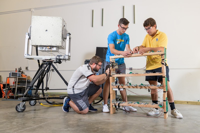 3 students working