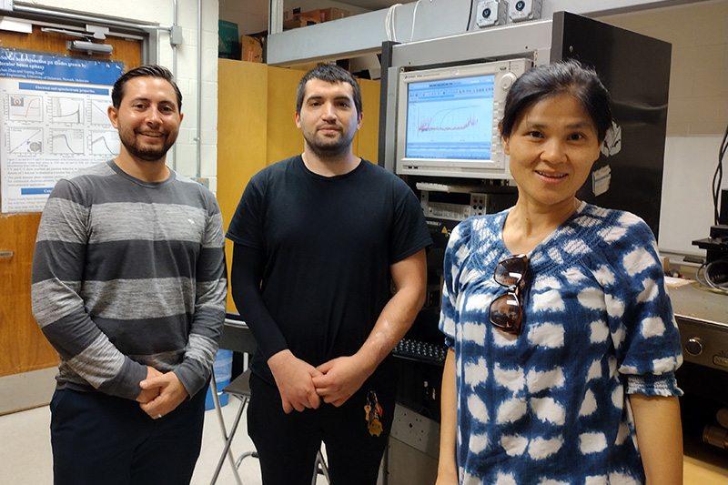 Postdoctoral researcher Elia Palmese, who contributed to device measurement, and undergraduate student Austin Biaselli, who contributed to device simulation, with Yuping Zeng. Courtesy of Yuping Zeng. 